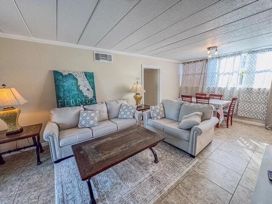 This unit is beautifully updated throughout with modern decor and a mix of coastal vibes that makes you feel like you are on vacation when you first walk in. Turn key and fully furnished  this unit is ready to make it your AirBnb, VRBO and YOUR vacation home  with short term and long term rentals allowed.The patio has views of the lush green courtyard and community pool. Steps away is your private beach area with access to the inter coastal waterway where you can use your paddle boards, jet skis or even your boat can anchor so your family and friends can get on and off or watch some beautiful sunsets over the Gulf of America in the distance.Located minutes from dining, shopping and the beautiful white sandy beaches of the Emerald Coast.Make this investment your best one yet call now