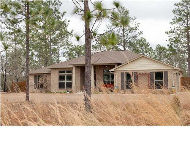 Renters Dream! This spacious 4BR/2BA home on 1 acre of land features upgrades galore. The large kitchen with stainless appliances, granite, island and ample cabinetry w/ breakfast nook, looks into the spacious living area and also has a formal dining or office right of the entry. The split floor plan offers privacy with 4 bedrooms and 2 baths, master suite on opposite side of home. Master bedroom and bath are very spacious with, double vanity, separate shower and large soaking tub. This home sits on an acre level lot, privacy fenced back yard w/ open patio, storage shed and the kids will love the swing set. This home also has a 2 car, side entry garage w/ opener. The subdivision has a lot to offer with a 7 mile walking trail, play area for the kids, stocked fishing ponds and pavilions with