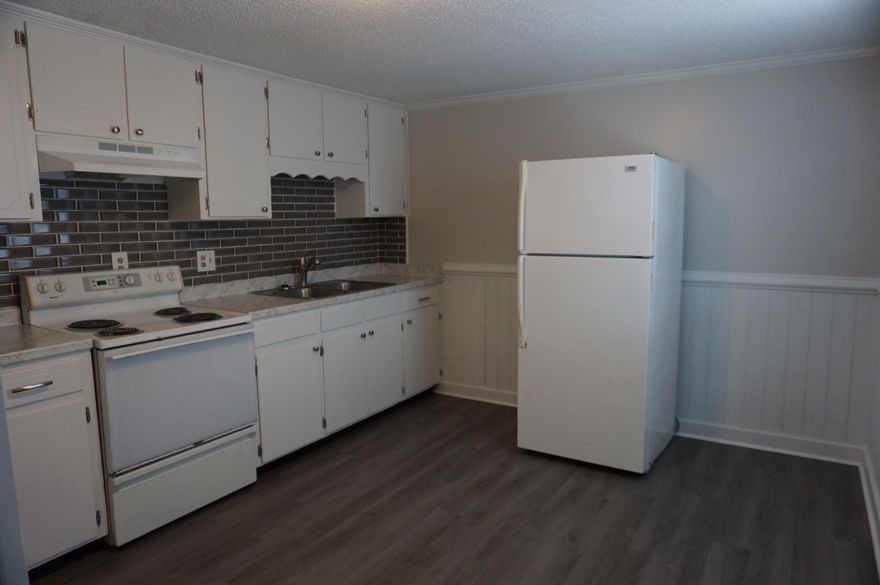 Available 04/20/2022.  End unit upstairs with easy commute to bases, beaches and shopping.  Recently renovated apartment with 2 bedrooms and 1 bath.  Featuring many new renovations.  Neutral paint, vinyl plank flooring, subway tile in the bathroom and kitchen back splash with updated lighting.  Parking lot for parking.  Minutes from the base gate.  Quarterly pest control service.  No smoking.  No vaping.  No pets allowed.