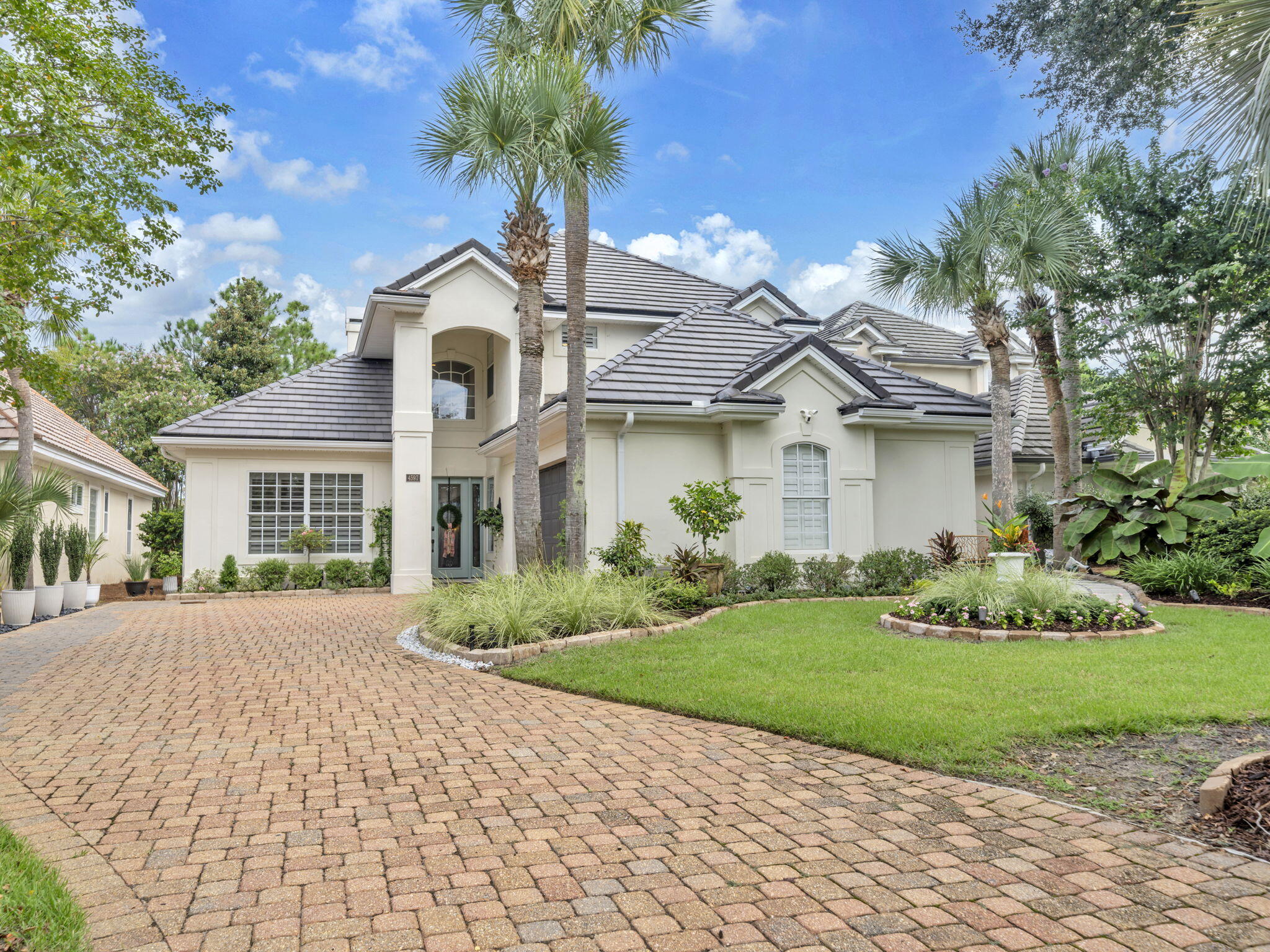 HIGHLY SOUGHT AFTER REGATTA BAY!! Enjoy the gated community of Regatta Bay's exceptional location in Destin, Florida!! World class beaches, golf, and a myriad of amazing restaurants await your enjoyment!! 4597 Sailmaker Lane offers a move in luxury residence!! Interior features include; new GE Cafe appliances, Taj Mahal quartzite edge countertops in kitchen, laundry, master, fireplace surround, new light fixtures, Culligan whole house water conditioner, Culligan reverse osmosis drinking water. Exterior features; lush landscaping, new roof 2023, pool plaster / tile 2024, electric car charging station, and elastomeric paint. Enjoy the serenity and privacy of the nature preserve just off the expansive pool deck. Make 4597 Sailmaker Lane your family's Destin address today!!
