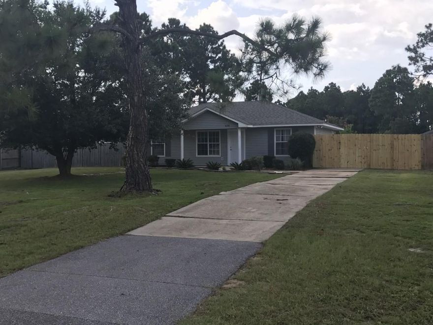 Perfect home for a family or rental property. Open and split floor plan with upgraded floors throughout. Perfectly located near Hurlburt Field, Navarre Beach, and within commuting distance from Elgin. Large fenced in back yard.