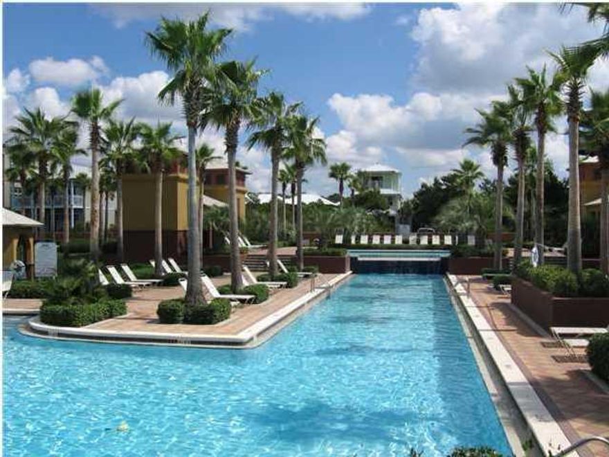 UNDER CONSTRUCTION in Seacrest Beach with estimated completion date of 10/30/14. This 3 story, 4 bedroom home plus bunk room features pine wood floors throughout, wood beam ceilings on the first floor and a built in 60'' TV recessed in the wall in living area. The designer kitchen consists of shaker style white cabinets, quartz countertops, tile backsplash, stainless appliances and a 10x42'' island and custom hood. The clean lines and open floor plan are perfect for entertaining. There is a front porch and large sun deck on third floor to enjoy outdoor living. This home is conveniently located with easy access to the 12,000 square foot tropical pool. Seacrest Beach is the ideal location situated between Rosemary & Alys Beach and the perfect spot for a vacation rental or second home.