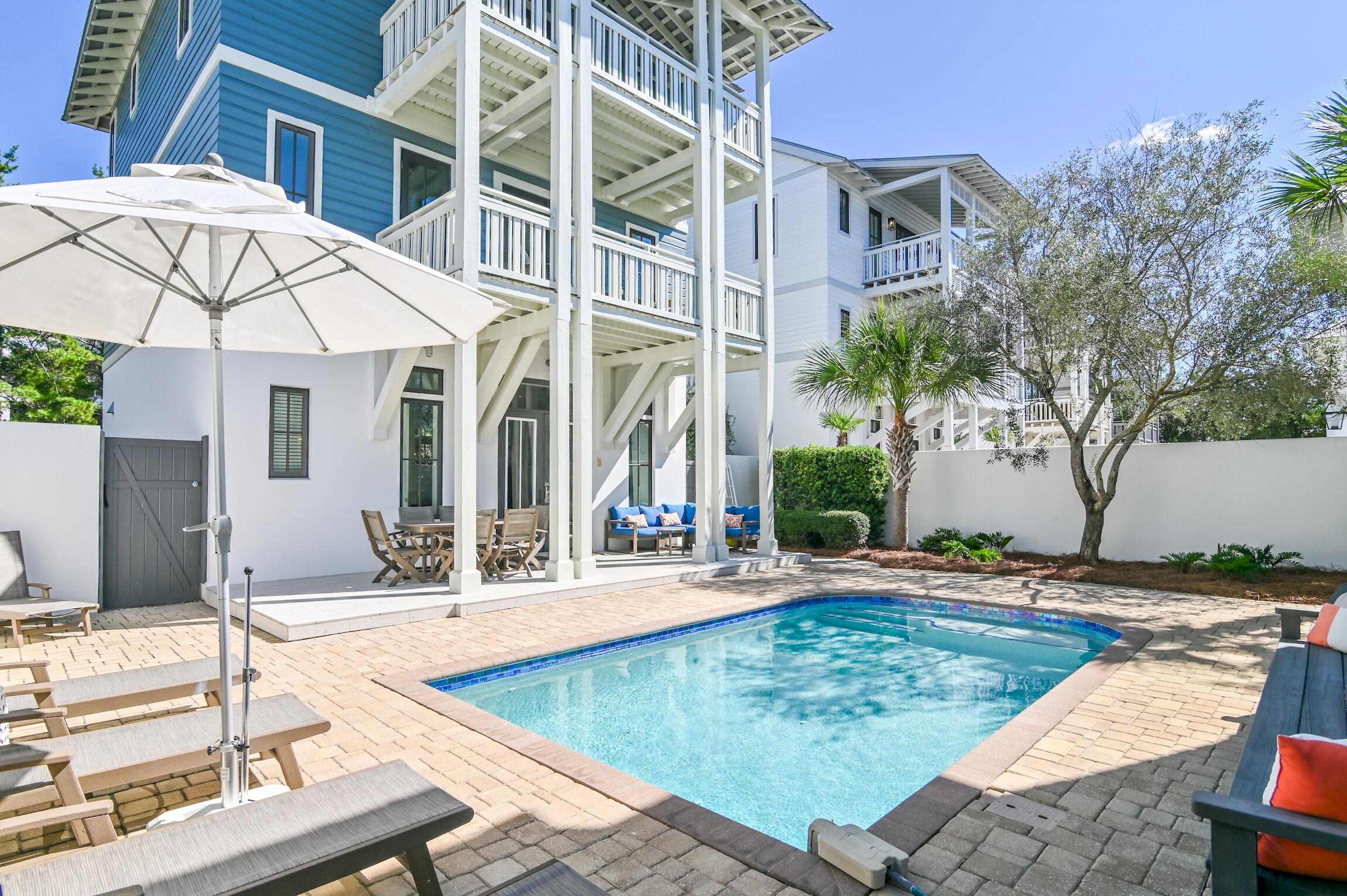 Overlooking the Racquet Club of Rosemary Beach, this serene oasis is nestled on Winston Lane and spans a private courtyard and newly refinished heated pool with a garage and carriage home. Boasting 5 bedrooms with 2 sets of hallway bunk beds; this updated cottage has plenty of space for families and proven rental income and projections up to $170k annually. A fenced-in backyard and sealed back deck with a pedestrian gate to Big Bad Breakfast or walks to 30Avenue make this location a desirable retreat. A guest and owner's delight near entertainment, restaurants and shops of Rosemary and Inlet Beach with NO HOA. Ideal for a second home or vacation rental investment, you won't want to miss the opportunity to see this breathtaking property.