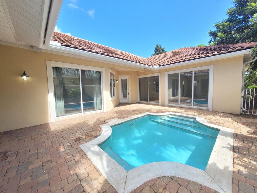 Take a look at this beauty! Stunning townhome WITH mother-in-law suite located in the Regatta Bay Golf and Yacht Club! Secured entrance. Spanish tile roof. Two car garage. The main unit and the mother-in-law suite both surround an inviting gated courtyard with private swimming pool. Large sliders in bedrooms open up to the courtyard. Main unit is a two bedroom, 2 bathroom with large kitchen and huge great room with built-in cabinetry. Oversized sliders in living room open up to a large tiled open patio in back yard. Garden tub, double vanity, shower, and walk-in closet in master suite. Mother-in-law suite features a spacious bedroom with closet, dining/living space, full bath, and a kitchenette. Fresh paint and new carpet. There is nothing likes this currently on the market!