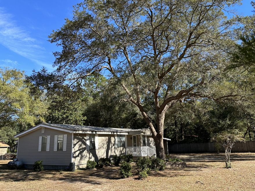 This property has so much to offer! Wether you're looking  for your forever home or a stepping stone. This beautiful home is the ready for you!Main home is a 3 bed 1 bath with an additional In-law Suite/ Guest Home and a 593 Sq Ft Shed. Easy Access to Hwy 85, minutes  away from the up coming Crestview Commons, Grocery stores, Shopping, Various restaurants and so much more!