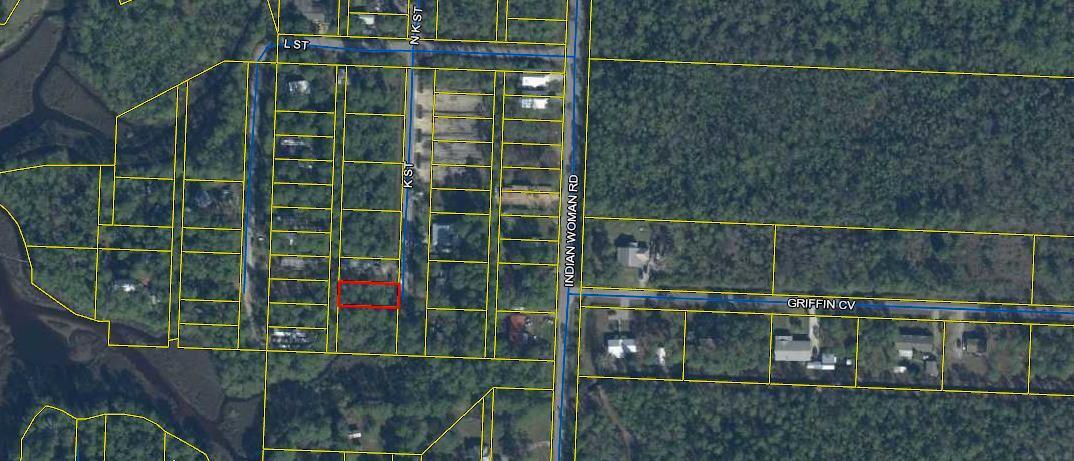 Vacant wooded lot in a growing area of Santa Rosa Beach. Build here and Enjoy privacy, fishing, canoeing etc... Located near Choctawhatchee Bay and within 20 minutes of the Beach.