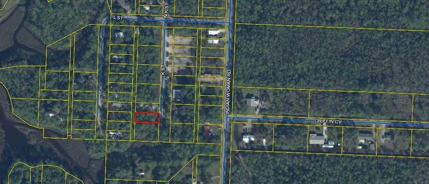 Vacant wooded lot in a growing area of Santa Rosa Beach.  Build here and Enjoy privacy, fishing, canoeing etc... Located near Choctawhatchee Bay and within 20 minutes of the Beach.