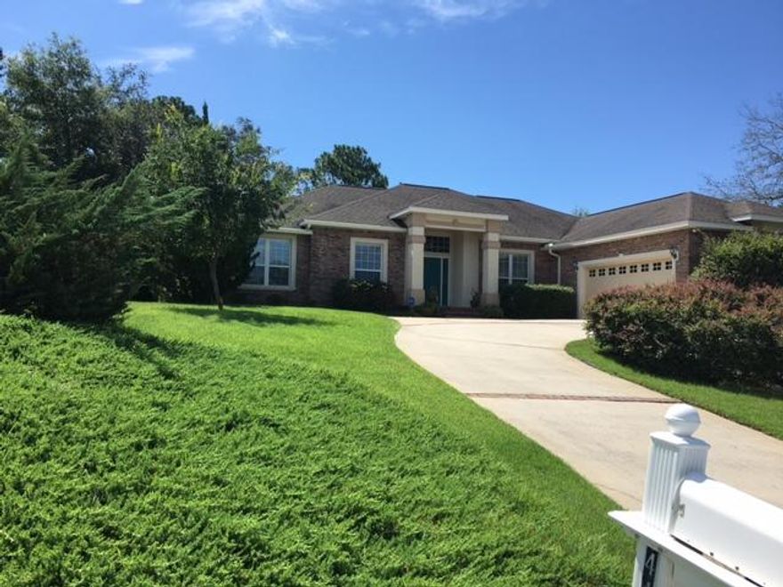STUNNING best describes this all brick beauty nestled on the 17th fairway of Rocky Bayou Country Club. Step inside and be greeted by raised ceilings, gorgeous archways, recessed lighting and a nice open floor plan. Large great room with beautiful coffered ceiling and a gas corner fireplace. Kitchen features a breakfast bar, large island with pull out shelving, gorgeous maple cabinets along with an eat in area overlooking the golf course. Large formal dining room with tray ceiling just off the kitchen. Large master bedroom with ensuite and french doors leading out to the back yard. Master bath sports double vanity, garden tub, private water closet and gorgeous walk in shower. HUGE laundry room with a large area now being used as a sewing room. This home has been well maintained and it