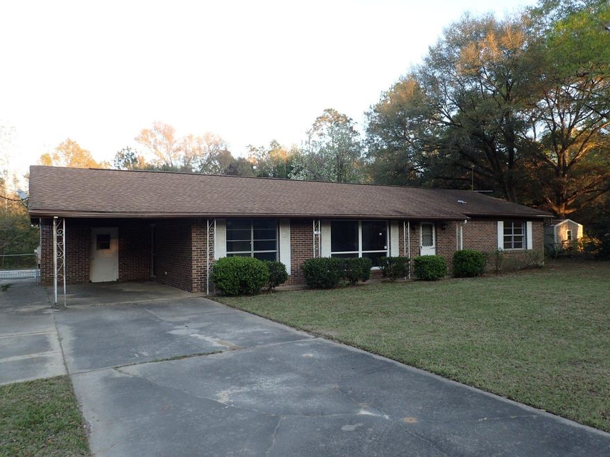 Looking for that deal? Well you just found it! Conveniently located just minutes from Hwy 87 and I10 and the SRCC this all brick home was built in 1978 and rests on a large .9 acre lot. Fenced back yard and attached carport, this home is nestled near the end of a dead end strip, limiting drive by traffic! 3 bedroom and 2 baths on the interior with large living room, kitchen and eat in dining area as well as large indoor laundry. A great price for a home that has tons of potential!