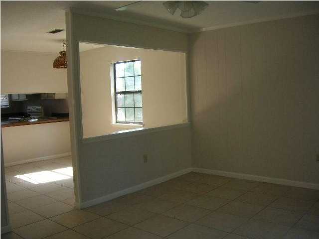 New carpet and paint! Cute townhome close to shopping and beaches. Call our office for a showing.