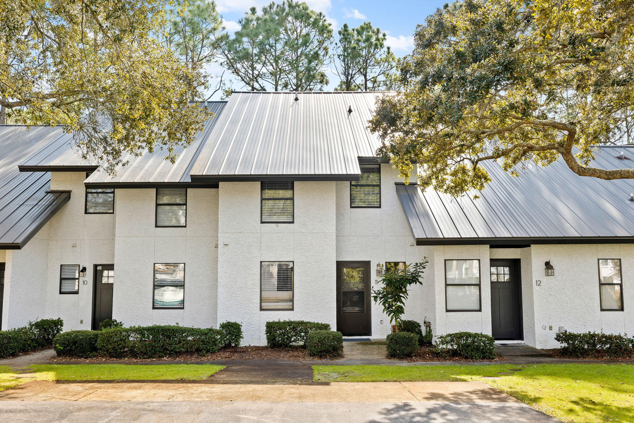 Welcome to 55 Shannon Drive, Unit 11, Santa Rosa Beach, FL - a remarkable property now available for sale. St. Joe Watersound Beach Club membership and one year of dues paid are to convey with sale of the property. This 1,288 square foot residence offers a harmonious blend of comfort and convenience, situated just 0.5 miles from the stunning Gulf of Mexico.The open-concept layout of the living area is perfect for both relaxation and entertaining. The seamless flow between the living room, screened in back porch, dining area, and kitchen enhances the sense of space and facilitates a comfortable lifestyle. The kitchen is thoughtfully designed to meet all your culinary needs, with ample storage and functional workspace. This well-designed unit features two spacious bedrooms, each benefiting from an abundance of natural light, creating a warm and inviting atmosphere. The property features two modern ensuite bathrooms and a convenient half bath on the first floor, providing ample space and privacy for both residents and guests.
One of the standout features of this property is the private dock, offering a serene spot for relaxation and easy access to water activities. Whether you enjoy boating, fishing, or simply taking in the tranquil water views, this amenity adds significant value to the property.
Additionally, this home boasts an updated roof, providing peace of mind and enhancing the overall value of the residence. This recent improvement ensures durability and protection, allowing you to focus on enjoying your new home without worry.
Located in the desirable Santa Rosa Beach area, this residence provides easy access to local amenities, shopping, dining, and recreational opportunities. The proximity to the Gulf ensures that you can enjoy the beautiful beaches and coastal lifestyle that this region is renowned for.
This property is a rare opportunity to own a home that combines modern living with the natural beauty of Florida's Emerald Coast. Contact us today to schedule a viewing and experience all that 55 Shannon Drive, Unit 11 has to offer.