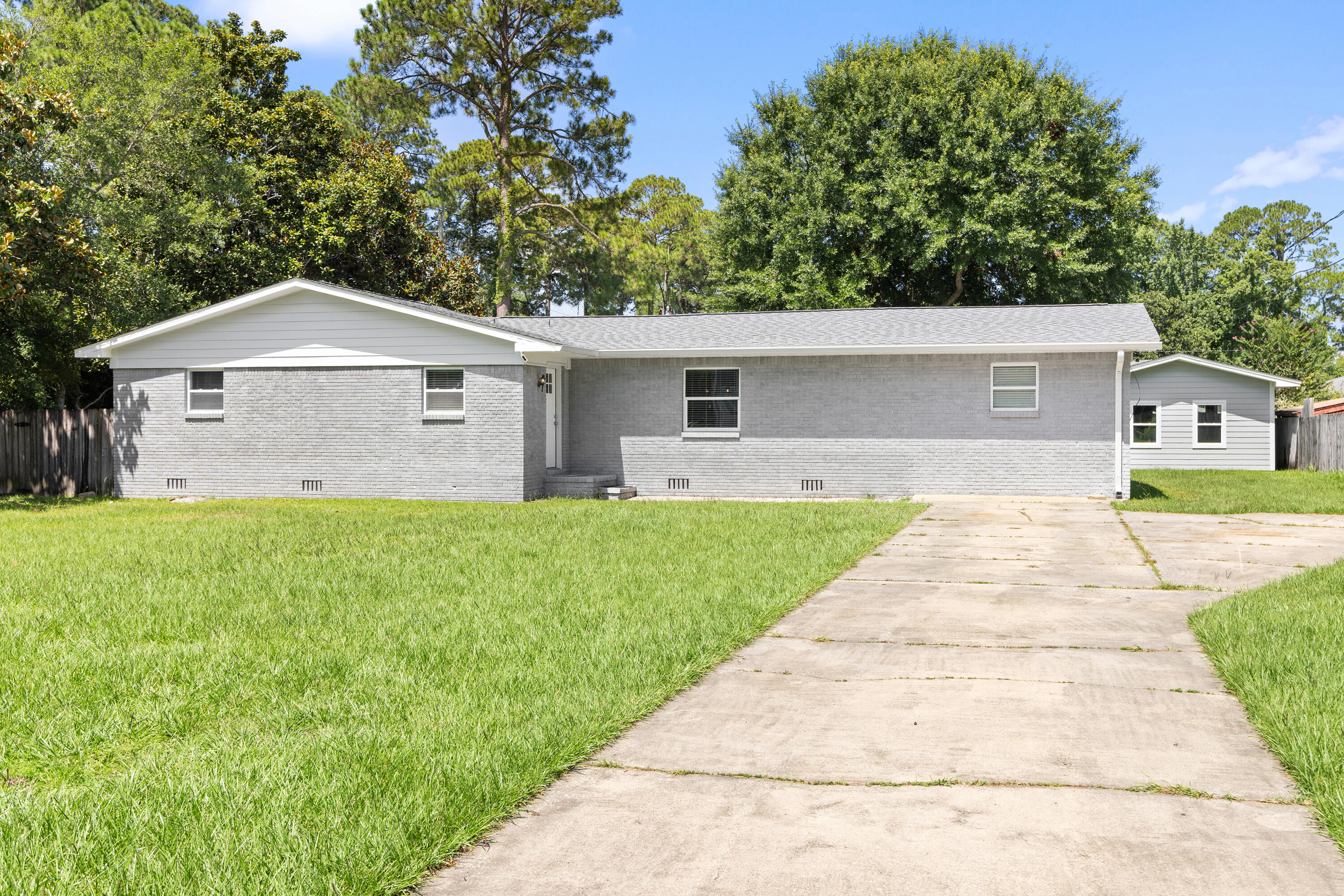 $500 off first months rent! FREE lawn care and gas bill covered! This basically brand-new home in the Overbrook area of Fort Walton Beach features a brand-new kitchen, new plumbing, and new flooring throughout. Vacant and move-in ready! We offer self-showings so you can tour on your own time, plus no security deposit with Obligo for qualified tenants and a Residence Benefits Package. Storage shed and detached back apartment are not included in the lease. Schedule a showing or apply at myspenceproperties.com.