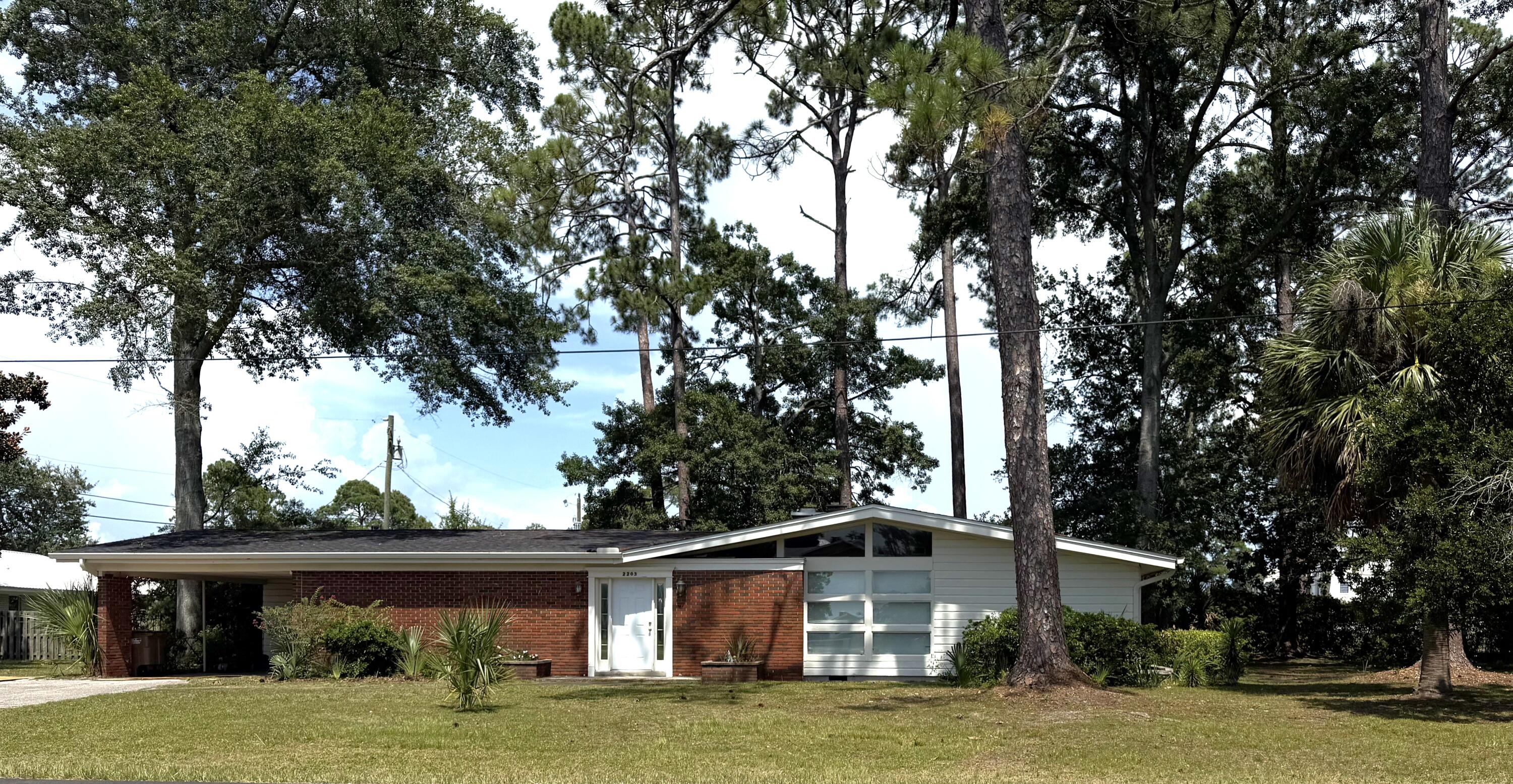 Great corner lot with views of Constitution park and peek-a-boo views of St Joseph's Bay. This 3 bedroom 2 bath home is situated in one of the longest established neighborhoods in Port St Joe and is a great jumping off point form almost any option one could want. No across the street neighbors as the long established Constitution State park offers easy access to stroll all the way to St Joseph Bay only a short walk or quicker golf cart ride to enjoy the tradition of nightly sunset watching. Easy access as well to the PSJ school grounds. If you love established trees, you will not find any better and older oaks, pines, and magnolias in town. Irrigation system and newer A/c system as well. Home will need some renovations and upgrades, but the location and grounds are setting the value.
