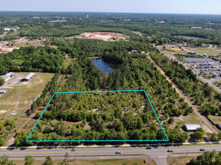 Fantastic development opportunity with multiple options. Perfectly level, wooded land, comprised of 2 parcels, within walking distance to schools, parks, and less than 5 minutes to downtown DeFuniak Springs. Per city planning, up to appx 11 lots have potential to be created at 50' width each along Walton Rd. OR you could choose to subdivide it with a different layout with possibly more lots. Zoned R-1. No utilities at this time with electricity, city water and sewer available. All information believed to be accurate however buyer should verify anything of importance such as lot splitting, zoning, etc.
