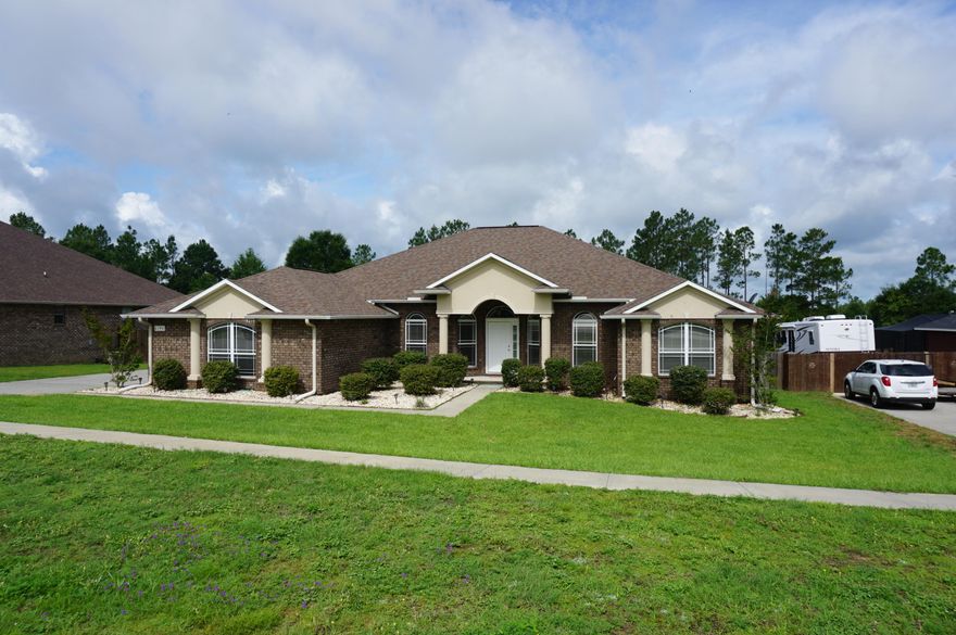 Available 07/08/2022.......1 YEAR LEASE ONLY...North Crestview home features over 3000 SQFT of living space, 4/3 floor plan and 3 CAR GARAGE...Spacious living room, formal dining room, office space, Florida room, 4 spacious bedrooms, 3 full bathrooms and so much more. Kitchen boasts granite counters, beautiful cabinetry, breakfast bar, eat in kitchen and large pantry. Open back deck with custom brick pavers. Privacy fenced back yard, oversized parking driveway, and 3 bay garage. This home is in a small subdivision in the country with large level lots with room and privacy. No inside smoking or vaping. Pets will be allowed with a $400 nonrefundable pet fee and owner approval. Lawncare included in rental rate.  Perfect rental if you only need a years lease or less.