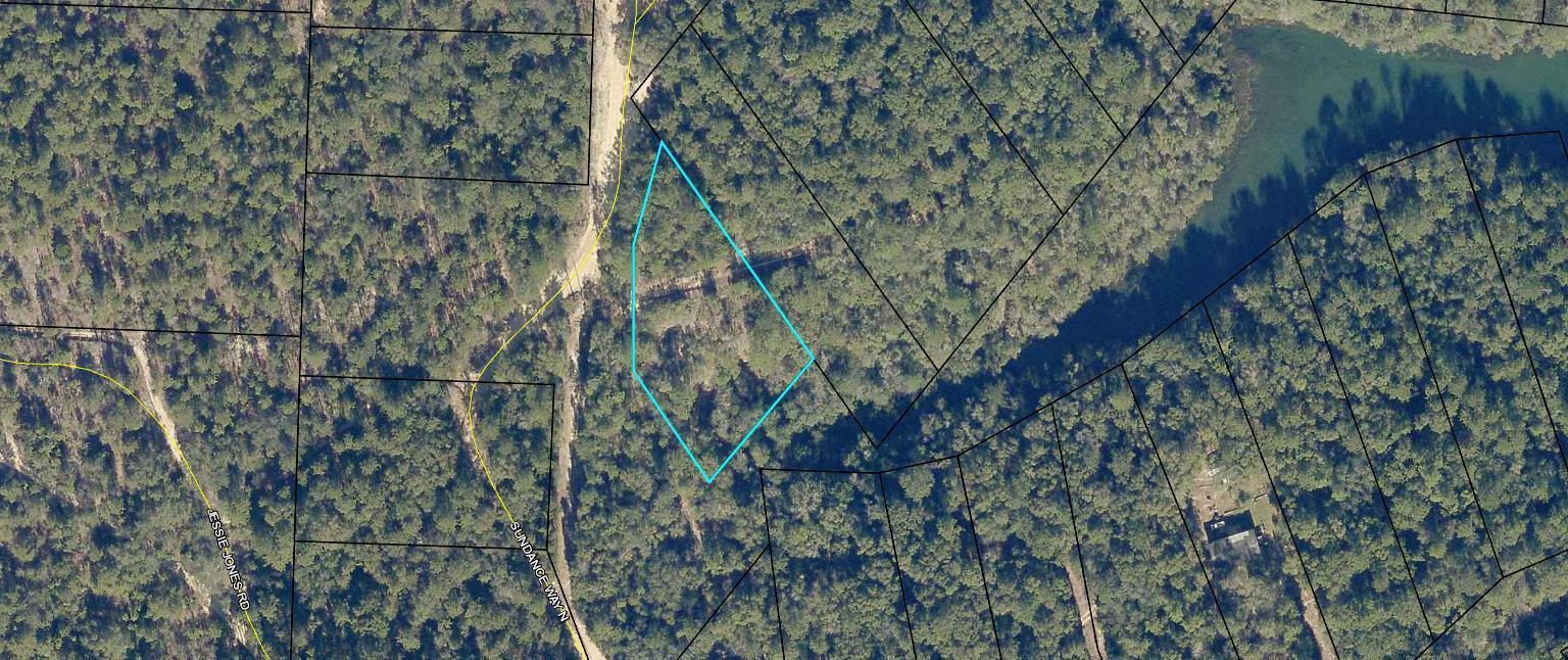 A hidden find that borders Little Blue Lake Looking for a place to escape - here is a chance for your weekend retreat. Adjacent lots available as well. Buyer to verify all information.