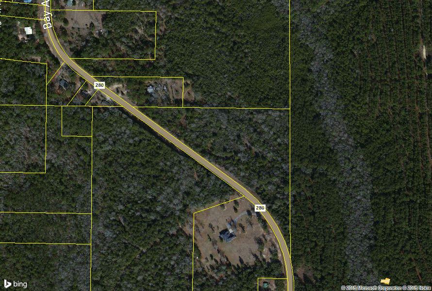 This great +/- 8 acre parcel in close to town and located on a paved road. If you are looking for a property to build your dream home this is the one. Less than a mile from downtown DeFuniak Springs and Lake DeFuniak, this property is the perfect location. The land is part of a larger acreage tract and is surrounded by large parcels. If you are wanting a place to get away, but close to everything, this is it. The property has a great building site and beautiful setting. This property is in the City of DeFuniak and has city water available.