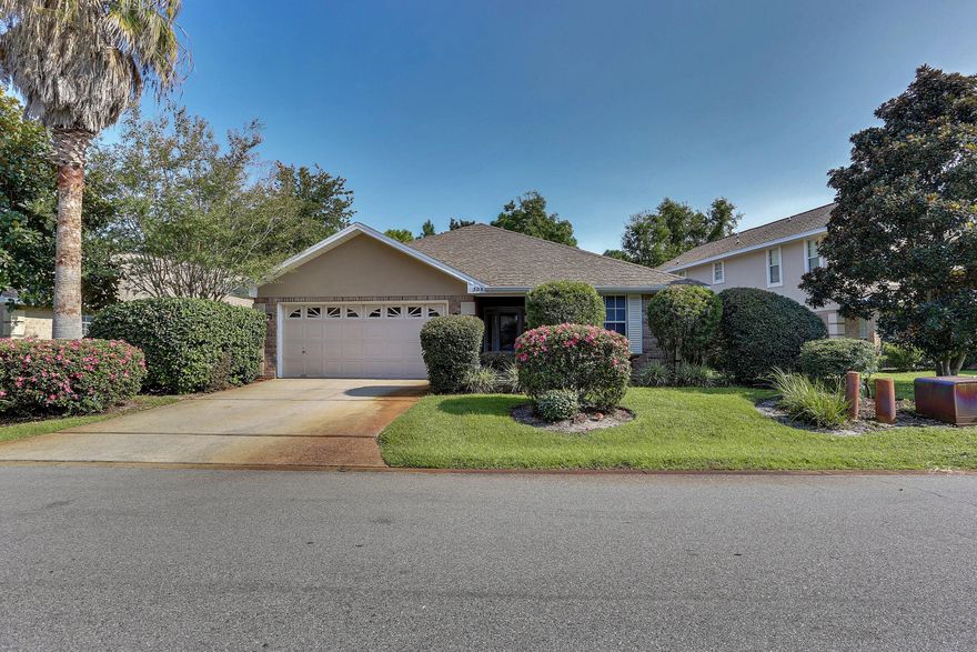 Located in one of Destin's desired communities. Immaculate 4 BR brick home with an open split floor plan. Seller has made many upgrades to include new flooring, paint throughout, and much more.  A/C unit is only a few years old! A very spacious screened-in Florida room and a fenced back yard.
