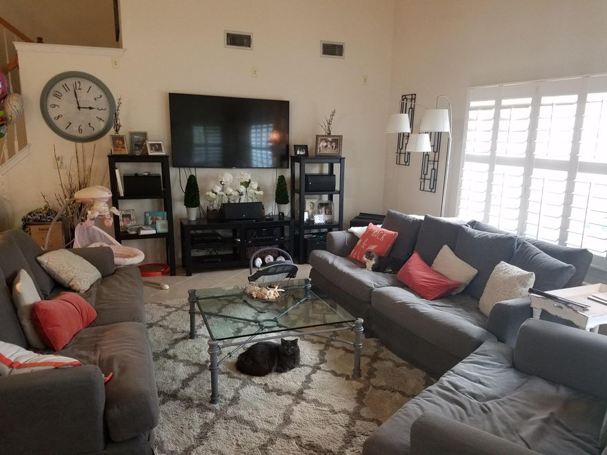 Beautiful home in a gated community. This 4 bedroom 3 bath home will not last long. Home is lakefront with screened in back porch and fenced in backyard. Perfect home for a large family or for someone who likes to entertain. Very open and spacious home is move in ready.