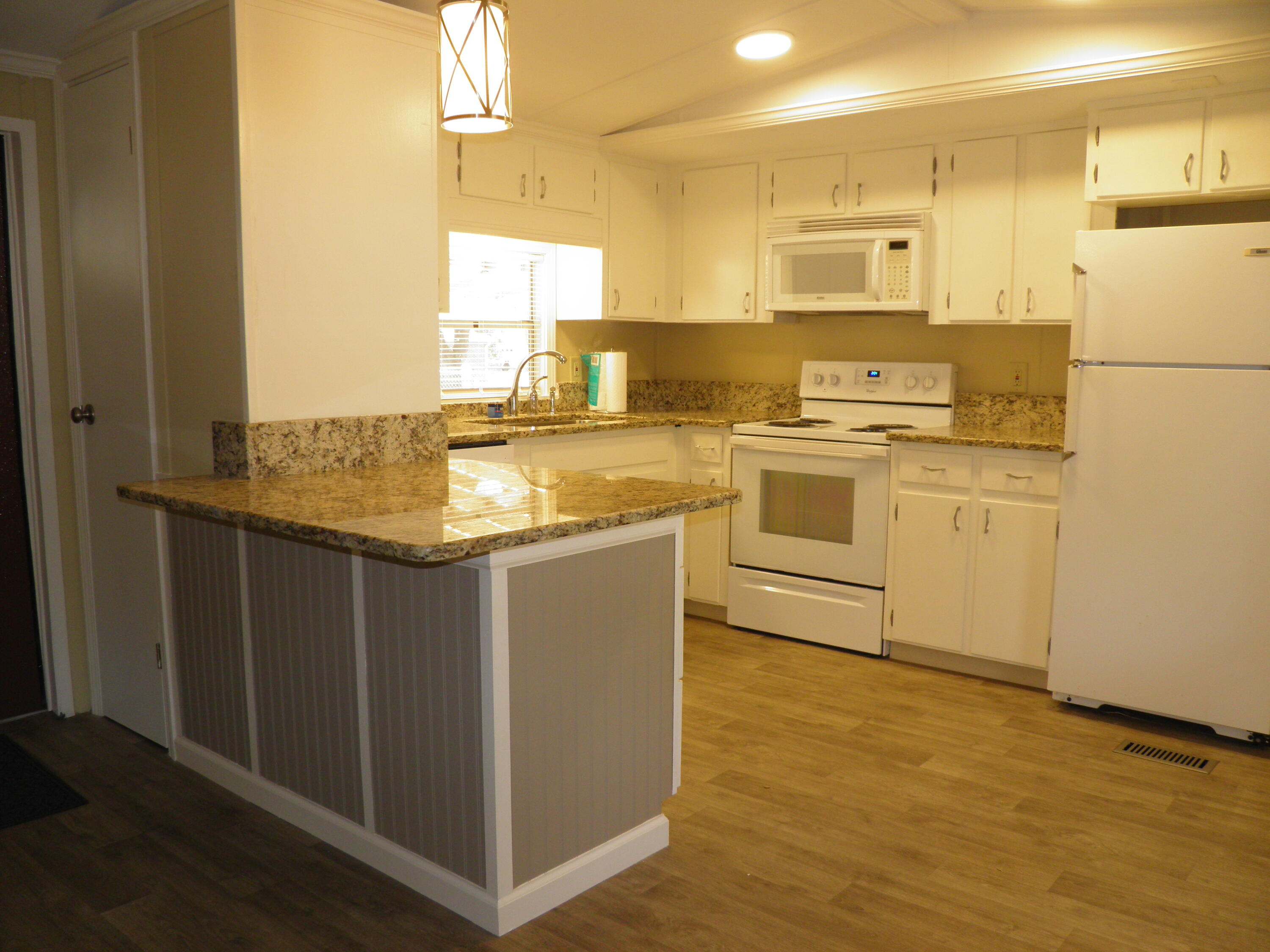 Available Mid to Late MAY 2025. Recently renovated home on it's own private lot/private driveway. Washer/Dryer available with Rent. Tenant responsible for all utilities. Well maintained, spacious 2 BR with 2 full Baths PLUS Office/flex space. One bathroom is en suite. Renovated kitchen with granite counters, kitchen Island & newer appliances. Newer metal Roof, covered brick patio,newer paint, newer wood look Vinyl flooring in most areas. Tiled, walk in shower in one bath. HVAC 2018. Gravel driveway. . No smoking, No vaping, No animals. Do not disturb tenants. Viewing by appointment only - no sign on property. Final rent and security deposit, subject to review of the application Owner is a licensed real estate agent