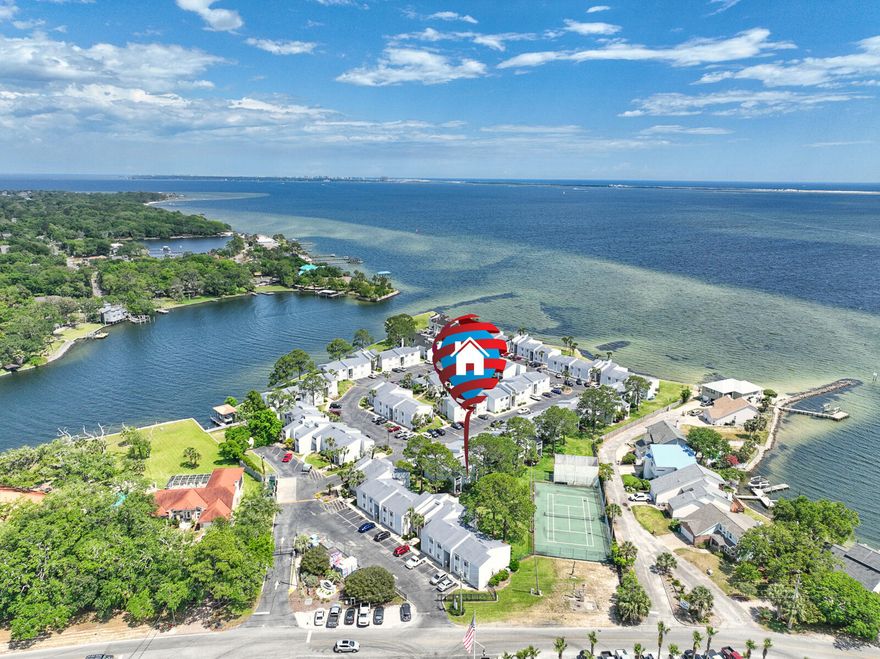 Ground floor, well maintained unit on the Bay, perfect for residents to enjoy fishing, kayaking, and paddleboarding! Two George's Marina is across the street to store your boat. Located 10 minutes away from Elgin AFB, Duke Field, and Hurlburt Field. Finisterra is a gated bayfront community with amenities that include assigned parking, large pool, sauna, tennis & handball courts, a clubhouse, and indoor laundry facilities.