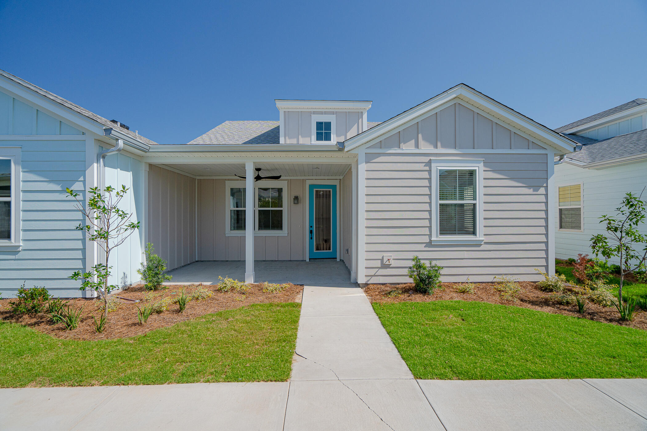 'CURRENTLY UNDER CONTRACT, SELLER ACCEPTING BACKUP OFFERS'BAND NEW Camellia floorplan in highly sought after Latitude Margaritaville.  Just north of scenic Highway 30A sits this well appointed 2 bedroom, 2 bath and 2 car garage home with incredible vaulted ceilings. This beautiful cottage offers NUMEROUS UPGRADES including upgraded countertops, appliances, cabinets and beautiful beams in the living room ceiling...just to name a few.  Come enjoy paradise living nestled among all the Emerald Coast has to offer and enjoy all the amenities that are just a golf cart ride away!  Don't wait and start enjoying island life living in this amazing 55+ community!!