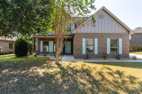 Photo of 125 Whitman Way, Freeport, FL 32439 (MLS # 988232) Photo of 125 Whitman Way, Freeport, FL 32439 (MLS # 988232)