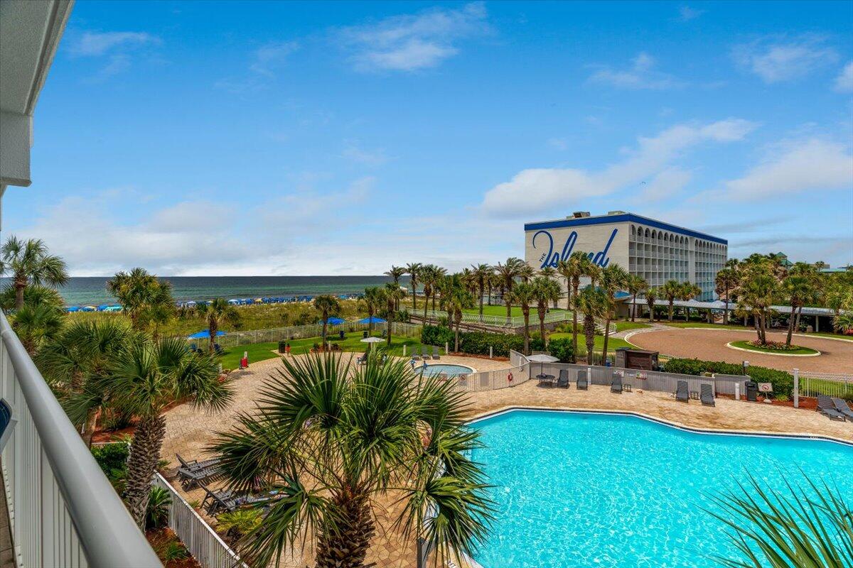 Unit 305 truly stands out! View and location is everything when purchasing a beachside condo. This has it all. Situated just above the palm trees and high enough to take in the sparkling emerald gulf and sugar white beach. The 3rd floor is level with a footbridge that will whisk you away to another paradise on the bayside.This fully furnished 1-bedroom + bunk room, 2-full bathroom condo captures the breezy charm of beachside living. The private balcony overlooks a large pool, hot tub and the gulf. As part of a premium resort community at Destin West, you'll have access to the lazy river, pools, hot tubs, fitness center, and more. Whether you're looking for a vacation getaway, an income-generating vacation rental, or both, this unit offers the best of both worlds.