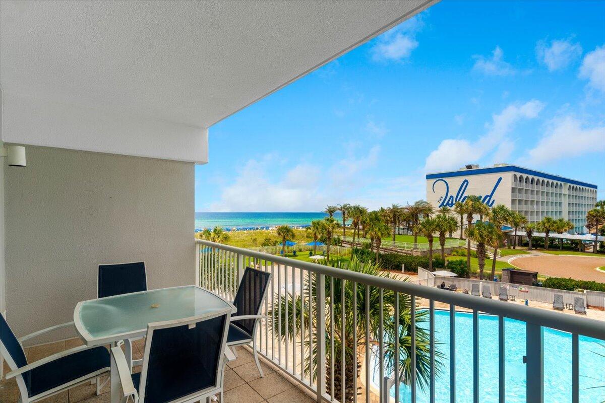 Unit 305 truly stands out! View and location is everything when purchasing a beachside condo. This has it all. Situated just above the palm trees and high enough to take in the sparkling emerald gulf and sugar white beach. The 3rd floor is level with a footbridge that will whisk you away to another paradise on the bayside.This fully furnished 1-bedroom + bunk room, 2-full bathroom condo captures the breezy charm of beachside living. The private balcony overlooks a large pool, hot tub and the gulf. As part of a premium resort community at Destin West, you'll have access to the lazy river, pools, hot tubs, fitness center, and more. Whether you're looking for a vacation getaway, an income-generating vacation rental, or both, this unit offers the best of both worlds.