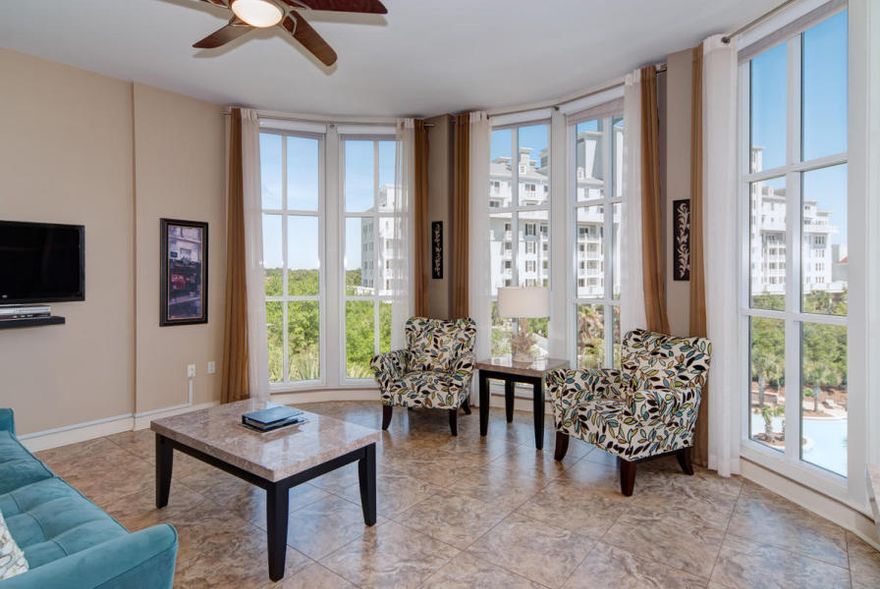 : This is a must see Bahia Condo in the Sandestin Resort. You can stroll to all the amenities in the Baytowne Wharf Village. Unit has many upgrades with tile flooring throughout, and granite counter tops, marble top dining room and end tables, leather bar stools and dining room chairs. A queen sleeper sofa, adds both to the luxurious ambiance, and the sleep capacity of the unit. A leather studded king sized master bedroom set completes the elegant furnishings of this fantastic Bahia unit. You will be impressed with the high ceilings and eight foot bay windows in the living room that masterfully show the view of the outdoor amenities. The condo features underground parking and private storage cage for owners.