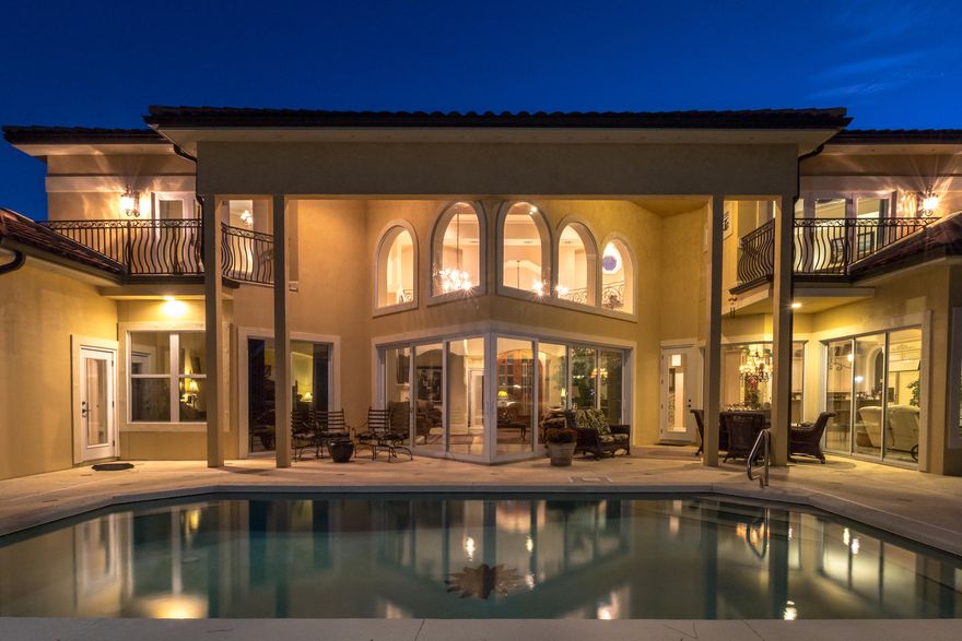 Just 7 minutes north of Sandestin and Grand Blvd yet worlds away rests a beautiful custom Mediterranean estate situated on 100 ft of Choctawhatchee Bay. This showpiece's timeless, luxurious appointments; open, airy floor plan; and opulent landscaping are matched in exquisiteness only by the surrounding natural scenery. A large expanse of glass seamlessly merges the interior with the outdoors. A spectacular, fenced-in bayfront oasis features a large pool and covered sitting area. Characteristic of Mediterranean architecture, this well-designed home features a grand entry, umber tones, sweeping classic lines, wrought iron accents, a barrel tile roof, and an abundance of alfresco living. Jerusalem tile adorns the first floor, and intricate millwork is found throughout. Custom design finishes include: a custom front door, custom lighting, designer sink vessels throughout, 2 large, stone fireplaces designed by Jenkin Brink Co, designer cabinetry in kitchen and baths, and custom railings with solid brass capping. The epicurean kitchen features intricate tile work, custom cabinetry, 6-burner gas cooktop, double oven, granite counters, breakfast bar, and breakfast nook. It is easily accessible to main living, keeping room, formal dining, and lanai for entertaining. This home offers a private study and a separate media room that can easily be turned into a 5th bedroom. Both the 1st floor and 2nd floor master suites offer private outdoor access and luxurious en suites. The 2nd floor offers dual wet bars. In addition, this home features a new Rinnai hot water system, two new A/C systems, new paint in many areas inside/out, W/D on both floors, 2 separate garages, full irrigation system, and alarm system. Driftwood Estates is a private community located on a secluded peninsula on the Choctawhatchee Bay and within easy driving distance to Sandestin and 30A.