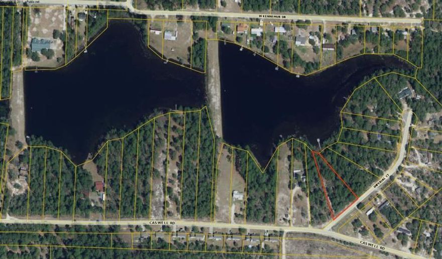 Quiet spot, great get away, Owner calls this a fisherman paradise, large lake front lot with private dock. Inviting for second home or full time living on a paved road. Property has access to all 4 lakes. HOA fee's are $100.00 annually