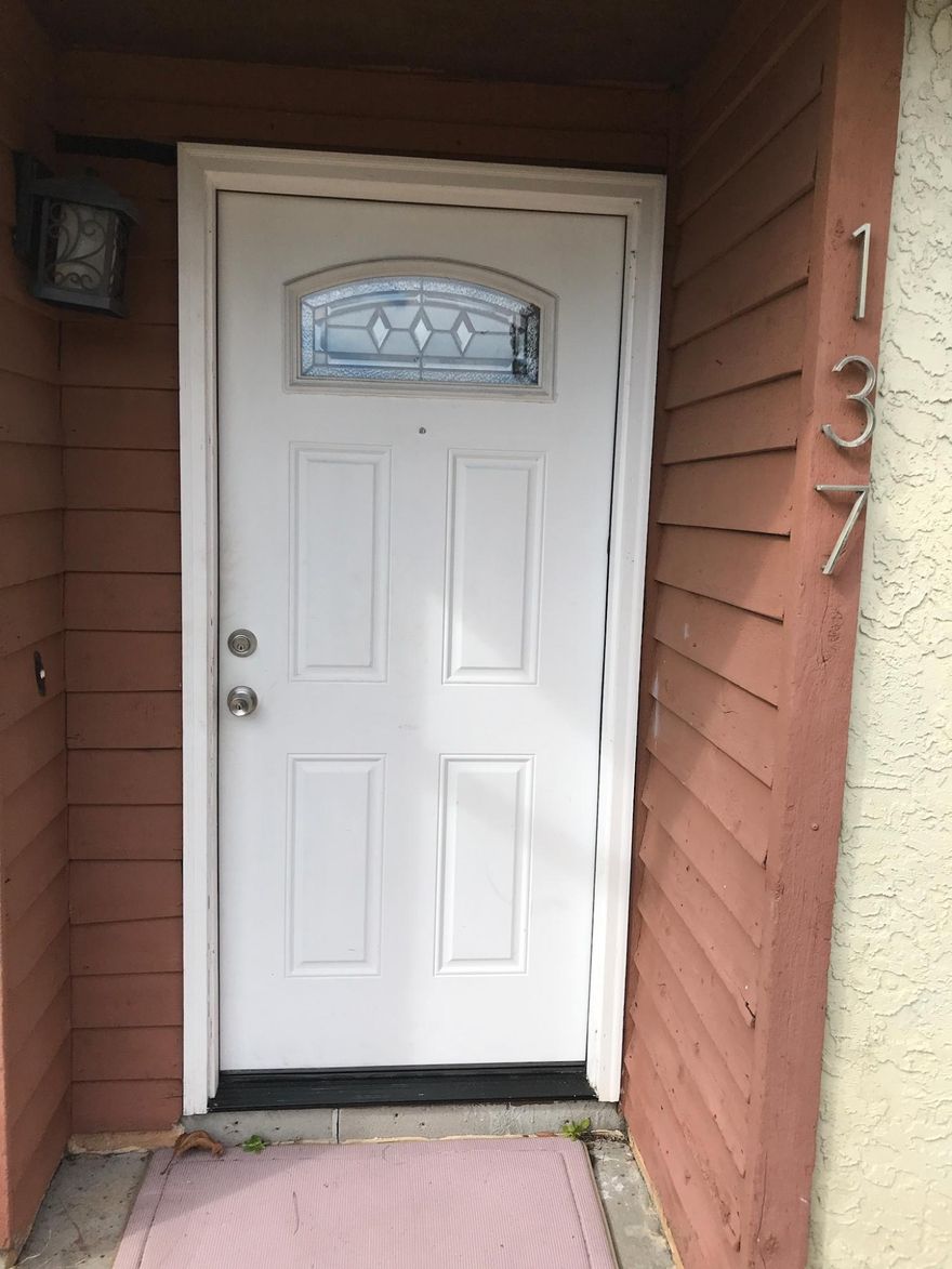This townhouse centrally located on a quiet cul-de-sac in the heart of Destin. First floor has laminate hardwood floors throughout the living room & dining room area. Sliding glass doors in living area lead to the private, & fenced-in back patio and storage closet. Kitchen features a breakfast bar, tile floors, newer appliances and laundry room off the kitchen area. Half bath also downstairs along with large storage room under the stairs. Upstairs are two Bedroom and a full bath. NO ASSOCIATION