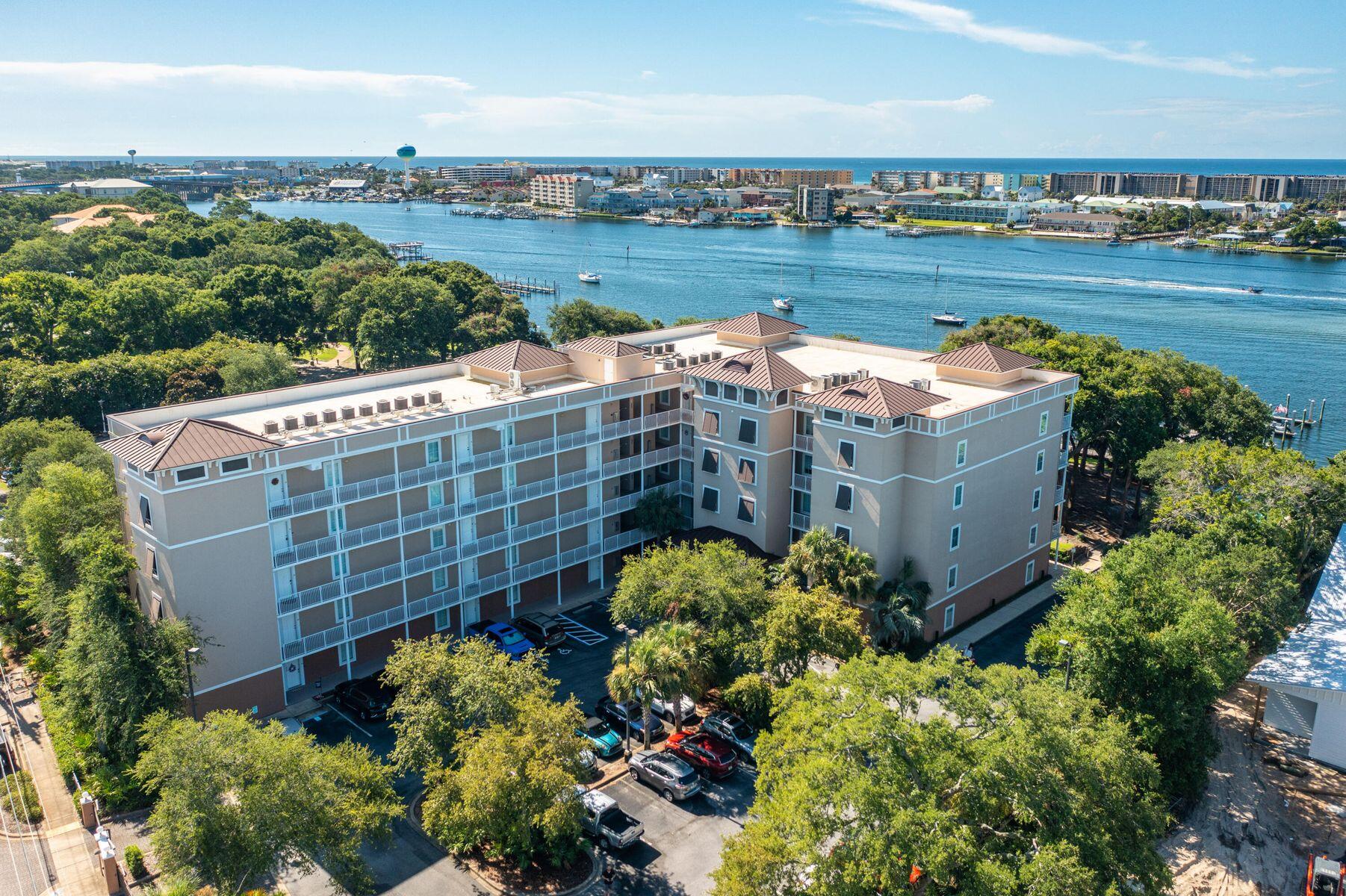 Now offering owner financing at 5.5% with only 5.5% down! Discover this beautifully renovated ground floor penthouse with intercostal waterway views that combines modern updates with coastal comfort. Recently refreshed with new paint & fixtures, this spacious move-in ready corner unit is designed for easy living.The kitchen is equipped with brand new LG appliances, including a washer/dryer, making everyday tasks a breeze. With a new AC unit & water heater, you can enjoy a worry-free lifestyle. Each of the 3 bedrooms has its own ensuite bathroom, providing privacy and convenience for everyone.The condo amenities include a Soundside pool with restrooms, a sunset deck with a fire pit for relaxing evenings, a huge owner storage cage, & easy access to the Fort Walton Landing park. Park and downtown area. Built adjacent to the historic site of the Indianola Inn and Indian midden mound, the property offers a unique connection to local history. You'll enjoy convenient access to countless activities in the very nearby downtown FWB area like shopping, dining, nightlife, movie theater and even pickleball courts! 

For those who love the water, buyers may choose one of three 10'x30' boat slips and an additional climate controlled marine storage room that are both available for purchase separately!. Whether you're a boating enthusiast or simply enjoy the waterfront, this is a perfect addition!

This home is a wonderful blend of modern updates and coastal living, perfect for anyone seeking comfort and convenience. Don't miss out on this opportunity to enjoy life in this newly renovated condo.