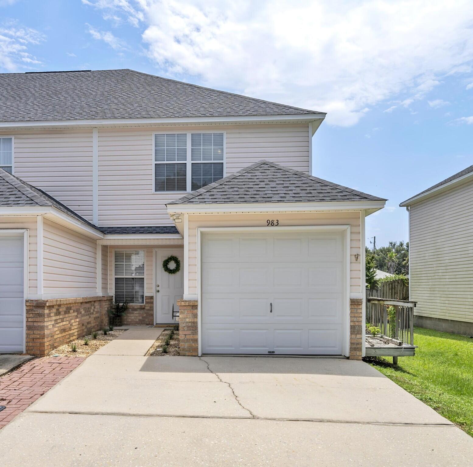 Excellent location between both Eglin and Hurlburt! This well-maintained 2 bedroom townhome offers a spacious living area with guest half-bath on the first floor, generous size laundry room and private back patio with gate and covered awning. The kitchen has stainless steel appliances and breakfast bar overlooking the living area adorned with crown moulding. Upstairs are two large bedrooms, each with their own en-suite. Plenty of closet space. 3 year old roof and water heater. 4 year old HVAC system. This home is truly move-in ready! Short distance to all that Fort Walton Beach has to offer!