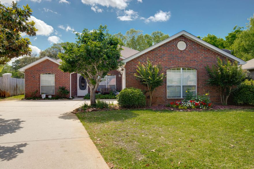 BACK ON MARKET, Buyer fell thru. Looking for a beautiful 4 BR Home close to the water in a gated community, WITHOUT the high, gated community price? You've found it! Sitting on one of the LARGEST .29 ACRE LOTS in the subdivision, and offering all the ''extras'' such as a 340SF screened Porch & separate Fl rm/office, this Home is only ONE BLOCK from the water! . Buyer fImagine beautiful, early morning & sunset walks to the Santa Rosa Sound. Offering an open floor plan, this Home's spacious Kitchen w/custom cabinets, solid surface counters, SS appliances, eating bar & island w/hanging pot holder takes center stage & adjoins the Great room & Dining room. High ceilings & lots of windows provide an open feel. Crown molding, trayed ceilings, plant ledges & angled gas fireplace add architectural interest. Offering a split floor plan, the spacious Master bedroom located away from the other bedrooms, adjoins a large master bath with his & her sinks, jetted tub & walk-in shower.  Other 3 bedrooms are good size. A year round Florida room is ideal for a Den/Office.  The huge 340 SF screened porch with Hot Tub provides lots of additional living space & allows you to enjoy the Florida lifestyle!  Other features include laundry room, 2017 Refrigerator, 2017 Carpet in the Living & Florida rooms & all the Bedrooms, 2011 HVAC, 1 year old sprinkler pump & Ademco security system. The large fenced back yard with patio, greenhouse, outdoor shower, & yard shed, provides privacy and plenty of room for relaxation & play. It also has a 2nd fenced side yard ideal for a pet.  Located in Mary Esther, just 2.5 miles West of Hurlburt gate, this Home is close to schools, shopping & the base.  Come see this fantastic Home today.