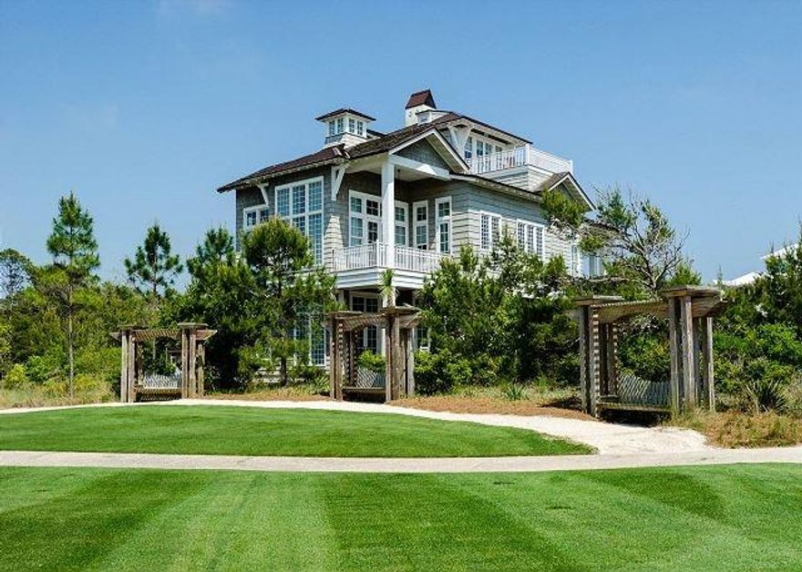 360 DEGREE VIEWS ON THIS BEAUTIFULFURNISHED HOME AND READY FOR YOUR DESCRIMINATING BUYERS,DRAPERY BY TRACERY INTERIORS ACCENT THE SOARING FLOOR TO CEILING WINDOWS, Truly majestic and outstanding from every aspect, built by Dune Construction it has everything you could want in your beach escape. This professionally designed home is majestic and alluring overlooking and adjacent to LINEAR PARK AND YACHT POND, which feels like your own private backyard. Unique features include Antique wood floors milled by the Amish to the custom kitchen cabinets constructed from the remains of a weathered barn which gives a wonderful contrast to the stainless steel appliances in a kitchen fit for the most discriminating chef.