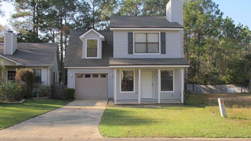 TURN KEY for UNDER $150k! Updated and ready for your family! This great home is close to Eglin AFB, Twin Cities Hospital, Northwest Florida State College & zoned for Niceville schools! Many fabulous updates for peace of mind including: NEW (2016) vinyl siding, stove, interior paint, upstairs carpet, windows, deck railings, ceiling fans, toilets, vent fans, NEWER (2013) fridge, dishwasher, HVAC (2012), roof, garage door opener, water heater (2008), and more! The large family room includes a stunning stone fireplace and opens to the dining space. The galley kitchen features painted cabinets with new hardware and all appliances convey. The first floor also features storage closets, a half bath, and a back entrance out to the rear deck. Upstairs includes 3 large bedrooms and 2 full baths.