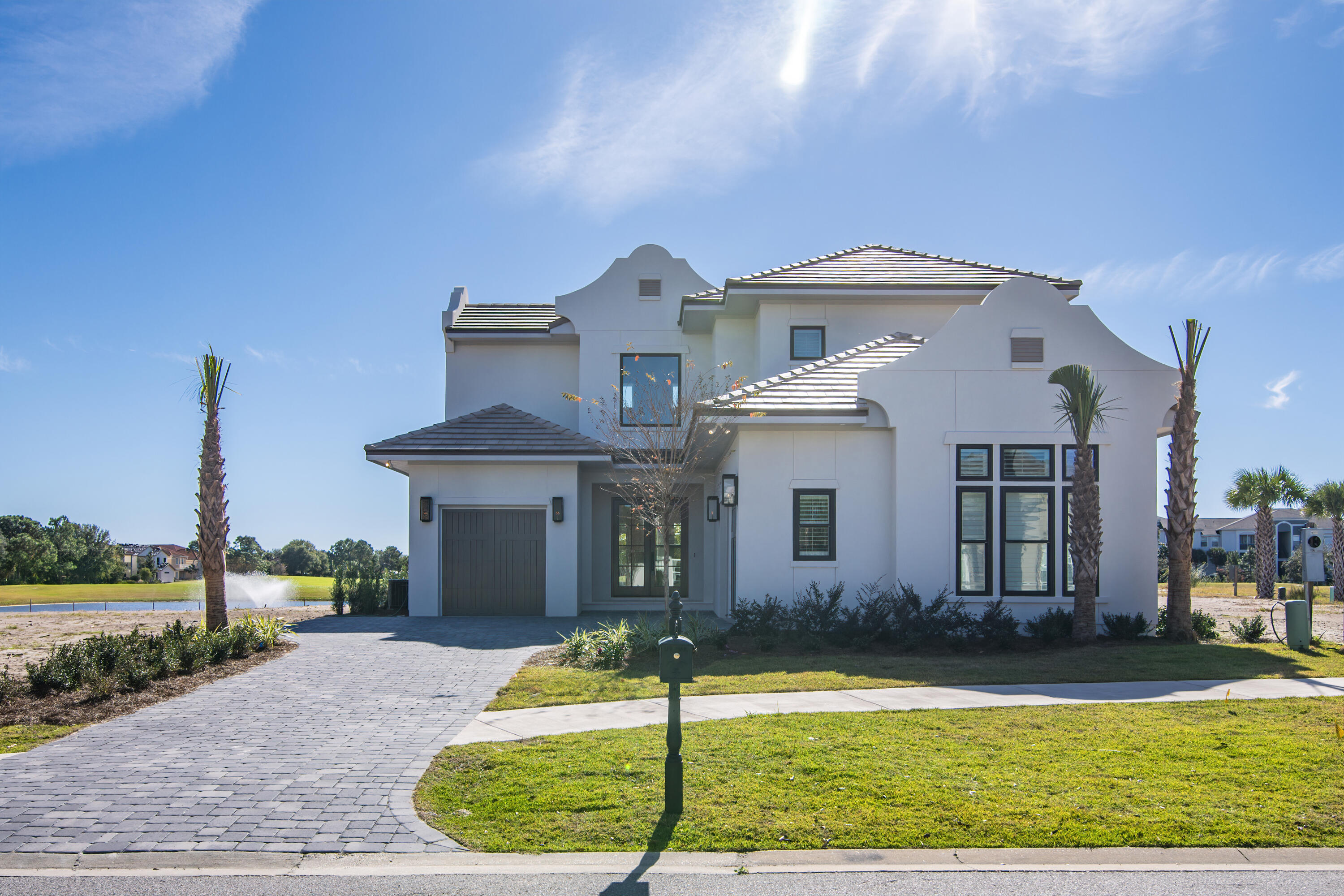 Tradewinds is the newest community in Regatta Bay consisting of 54 homes. The homes will have a West Indies style of architecture with a Dutch influence. *Watch video to see what it's like to live in Regatta Bay. The new homes will have a modern flair with custom details, high end finishes, courtyard pool options and lots of outdoor living space. This beautiful home is under construction and already has all of the designer chosen finishes selected and on order.*designer selections are located in the documents section