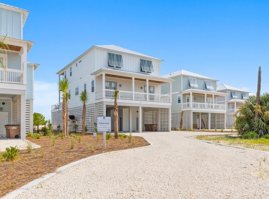 NEW 2023 CONSTRUCTION! ELEVATED POOL WITH OCEANFRONT VIEWS!With two large decks overlooking the Gulf, your own private pool, and the sugar sand beach and clear blue water just feet away, Killarney Beach House is the perfect vacation spot in the Villa del Sol subdivision. This 3,300 square foot 5 bedroom 5 bath vacation home with an elevated pool and elevator was built in 2023 in a lovely private gated subdivision.Killarney truly captures the essence of all things coastal. You will be greeted with a large, open concept living and kitchen space boasting spectacular Gulf views. Take a step through the back doors facing the ocean to find yourself in the peaceful, breezy surroundings with an amazing, unhindered view of the Gulf and your own private elevated swimming pool. Back inside, the dining and kitchen area has beautiful hardwood floors, modern amenities, and a kitchen featuring a large island, appliances, and quartz countertops. The comfortable, roomy living space is the ultimate gathering spot for entertaining and making memories with friends and family. The first floor has a 1 bay view master suite with a king bed and attached private bathroom along with a bay view master bedroom with king bed. On the second floor, there are two Oceanfront master suite bedrooms with king beds and attached bathrooms, and a charming bunk room with 3 bunks and a full bathroom. The most inviting aspect of the second floor is that two of the bedrooms have access to its large deck overlooking the Gulf, while the bunk room has views of the bay. Walk down your own boardwalk from your coastal home and you'll find yourself on the miles and miles of sugar-white sand and pristine blue water of the Gulf of Mexico. Whether you enjoy combing the beach for shells, snorkeling, kayaking, sunbathing, surfing waves, fishing, or taking a leisurely stroll or horseback rides along the shoreline, you'll spend hours of fun while soaking up the sun.