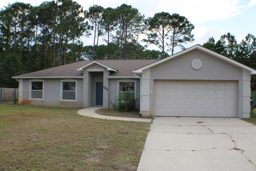 Ranch with 3 bedrooms, plus office/den. Large living room with fireplace. Kitchen has all new appliances. New carpet thru out. Large back yard with lots of potential.