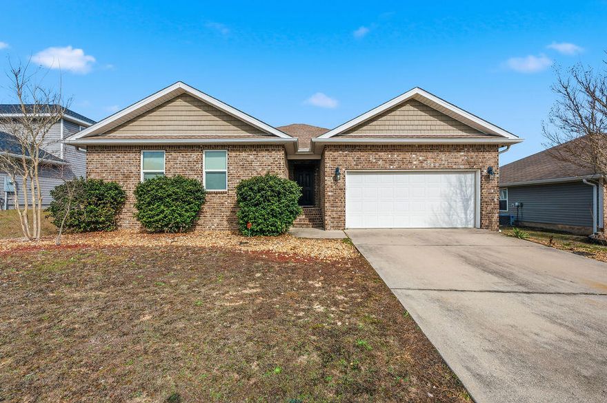 Move In ready, great location south of I10, conveniently located to Eglin/7th Group/EOD school. This home features an open-concept living area with a split-bedroom floor plan. The heart of the home is the expansive kitchen, complete with a large island/breakfast bar, perfect for entertaining or busy weekday mornings. Retreat to the private Owner's Suite, where you'll find a spa-like ensuite featuring a garden tub, separate shower, dual vanities, and a massive walk-in closet. Step outside to your covered back porch, an ideal spot for morning coffee or evening BBQs overlooking your level backyard. Situated in a quiet neighborhood this home offers the perfect balance of peace and convenience. New Roof 2024, newer appliances stove/dishwasher/built in microwave.