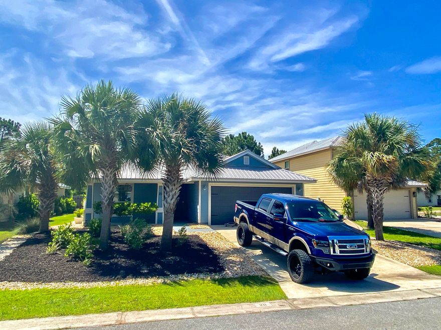 ENTERED FOR COMP PURPOSES This homes sits on a quiet street with only 8 homes and amazing neighbors. One of the best parts of this home is that your neighbor behind you is nothing but the tranquil 25 feet of wetlands which offers complete privacy and serenity. Unwind on your 33x13 deck complete with a two year old 6 person Hot Springs jacuzzi. As you enter your future home you are greeted with a shiplap foyer that extends into the front room. This 4 bedroom 2 bath 2 car garage is open floor plan that shows much larger than the 1789 square feet. Custom window treatments, 6 new LED lights added to the living room, newly painted inside and out, new light fixtures and fans. New front loading washer and washer, new dishwasher and stove. A/C recently serviced.