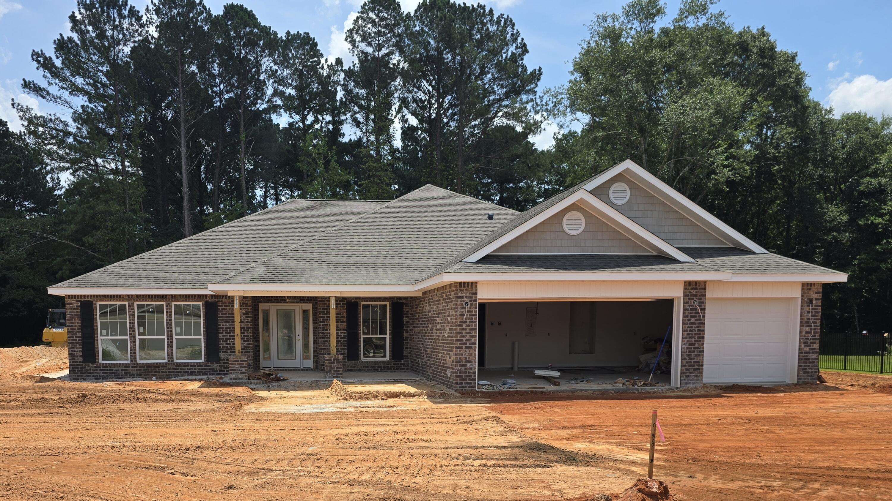 Builder Incentive $20K Your Way & the choice of REFRIGERATOR or BLINDS (certain restrictions apply). Corner Lot - 1/2 Acre!*Split Bedroom Plan, 3-CAR GARAGE,*10-Ft Ceilings in Main Areas *Click'n'Lock Laminate Wood Plank in All Living Areas *Tile Floor & Granite Countertops in All Baths *Kitchen features Granite Countertops, Large Island & Stainless Steel Appliances *Main Bath Zero-Entry All-Tile Walk-in Shower, Separate Soaking Tub, Double Vanity & 2 Walk-in Closets *Ceiling Fans in Main Areas & All Bedrooms *Covered Rear Lanai *Irrigation System *Builder & Structural Warranty *2x6 Exterior Construction