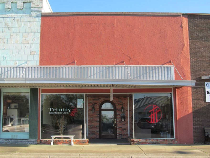 3156 S.F. commercial building located on Baldwin Ave. in downtown DeFuniak Springs. Be a part of the renaissance that is taking place on our ''main street'' in downtown historic DeFuniak Springs. The smart commercial investment now and in the future is Baldwin Avenue, Defuniak Springs's Main Street. Roof redone in 2018. Two new ac units. One in 2011 and the second in 2017. Seller upgraded the bathrooms and did a total building make over in 2011. currently leased at 900.00 per month. shown by appointment. 24 hours notice. cannot show on Sundays