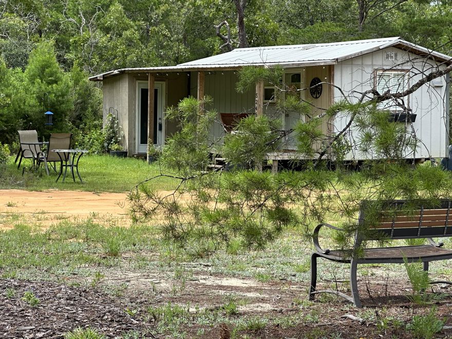 Wether you are in search of a home away from home or wanting to settle down in your forever home this slice of Paradise is tucked away on 10+/- Acres of Prime Agricultural Zoned Land. Enjoy easy access to Hwy 90 and Hwy 85 giving endless options on your local entertainment, restaurants, Shopping at the upcoming Crestview commons, and Beaches!