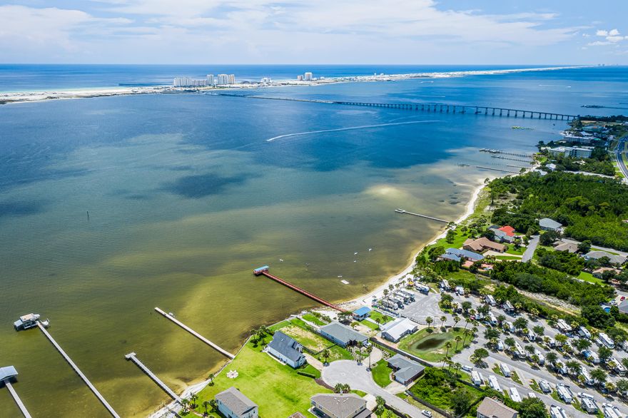 MOTIVATED SELLER REDUCED PRICE by $30K!! This Santa Rosa Sound Waterfront Lot has already been cleared & ready to build your dream home! Equipped with Sea Wall and Retaining Wall on the West side of Lot, 54' of Shoreline Frontage and approx. 1/4 Acres of Land gives you plenty of options! Great Location in East Navarre, close to shopping, restaurants, and less than a Mile from Navarre Beach! Seller has added 300 tons of fill dirt and comes with Survey, Flood and Wave Analysis, Permits, and Specifications Documentation. Currently the LOWEST PRICED Sound Front Lot in East Navarre! Don't Miss this Fantastic Opportunity to Own and Build on the majestic Santa Rosa Sound in Navarre!