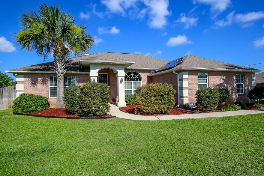 WELCOME HOME, CUT YOUR ENERGY BILLS with this homes solar panels and NEST system and two included cameras. This beautiful and well maintained home has 4 bedrooms, 2 full baths and is located inside of the much desirable subdivision of Holley By The Sea. The split floor plan has the master suite and laundry room on one side of the home and the other 3 bedrooms and bath down the hall on the opposite side. Open floor concept features large living room, formal dining area, tiled breakfast and kitchen area with granite counter tops. BRAND NEW AIR CONDITIONER IN 2018, comes with a 10 year transferable manufacturers warranty. Located on a large, half acre lot with a privacy fence, sprinkler system and well pump.