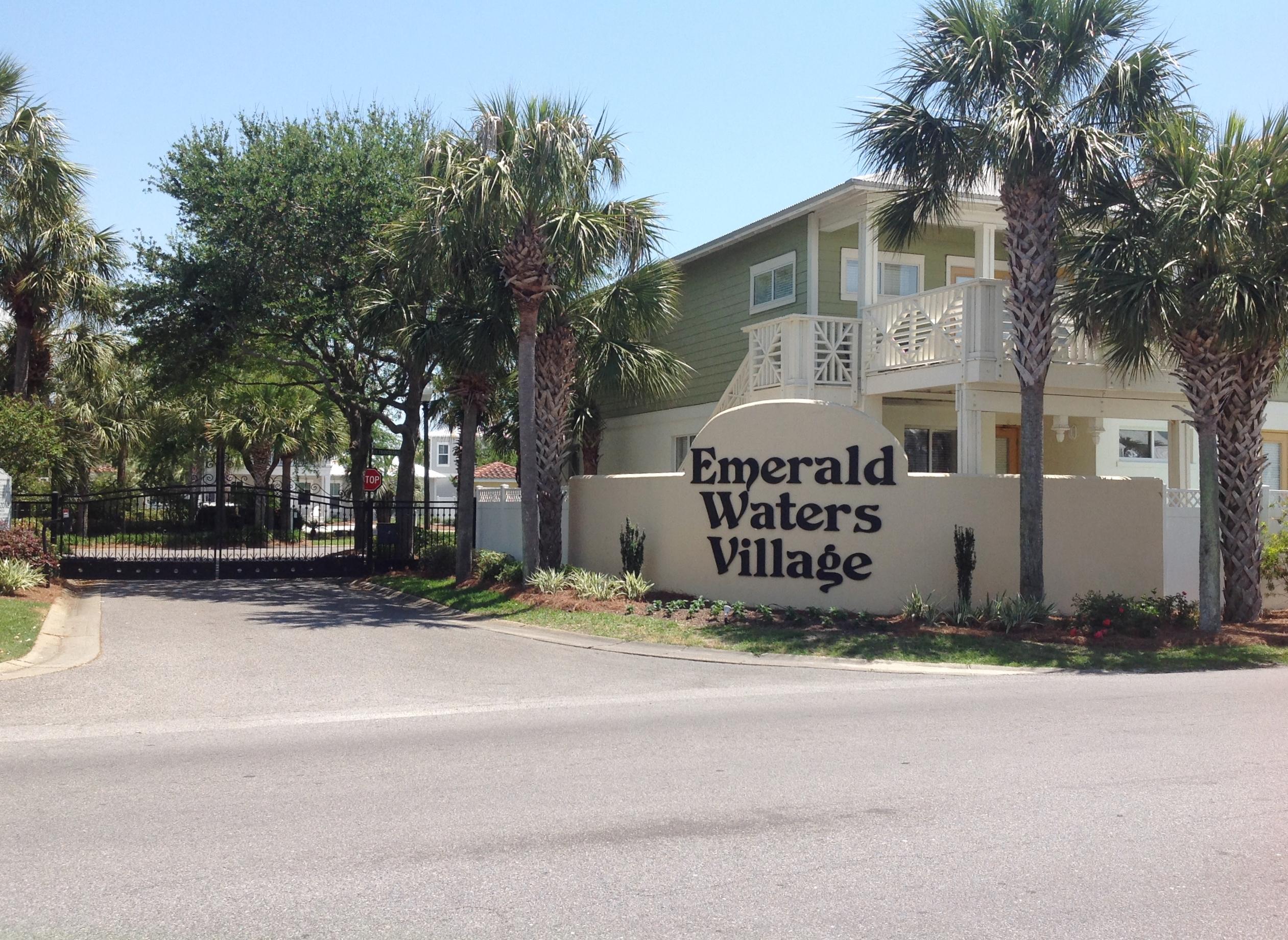 A RARE find! Large Villa lot in the gated community of Emerald Waters Village with deeded beach access, NOW AVAILABLE! Build your beach dream house AND a carriage house. Or build a duplex, so long as it looks like one residence. Possibilities are endless here. Live in side, rent the other, rent them both, or build a large, beautiful home. A hot spot for locals and tourists, these homes are rental machines! 2 community pools, deeded beach access, and extra guest parking, plus underground utilities. Beautifully maintained grounds with 2 park like areas to sit and relax as well. Water and sewer tap fees are PAID, and there's no build out time! Call your builder and grab this lot while you can! Come live in Paradise!