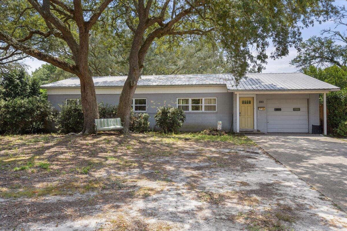 Situated on a sprawling corner lot, the property boasts a massive, fenced-in backyard that offers both privacy and space. The yard is perfect for outdoor activities, gardening, or simply enjoying the outdoors in your own secure haven.  This house is a fortress of stability, built with durability in mind.  Its major components are in great condition, making it an ideal candidate for insurance and financing   Just a half-block stroll from your sturdy home lies Ferry Park.  The diamond of gems in Fort Walton.  This park is the ultimate retreat for both relaxation and recreation. It's oversized walkways are perfect for a leisurely dog walk or a brisk jog.   For those seeking activity, the park offers a variety of sports facilities, including disc golf, tennis, pickleball and basketball. If you're up for a challenge, the park's circuit workout extends throughout the area.  And, let's pose another challenge for all the adults out there: join the social sports league and live recess again, but as an adult!  Too much fun!  Ferry Park isn't just for adults-kids can easily enjoy the swings, playground and entertainment areas.  Plus there's a spacious pavilion, ideal for hosting social gatherings, family picnics, or any other special event you have in mind.   Some people say location, location, location is the key to property.   We couldn't agree more, but we are narrowing it down a bit to Texas St, Texas St, Texas St.   So, come on cause This loveable ranch home wants to "wrastle" you on home! 